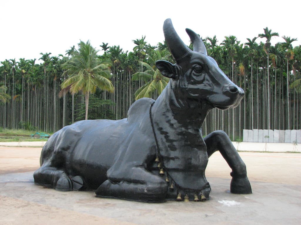 Spiritual statue under moonlight